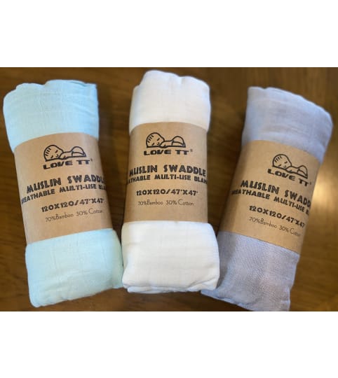 Assorted Muslin Swadling Blankets (set of 3). An arrangement by The Flower Box Florist.