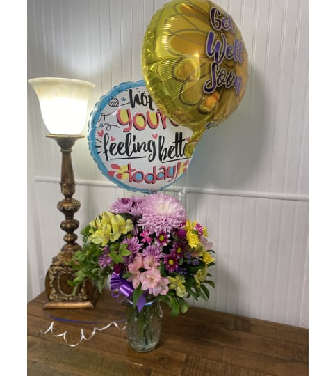 Get Well Wishes. An arrangement by The Flower Box Florist.