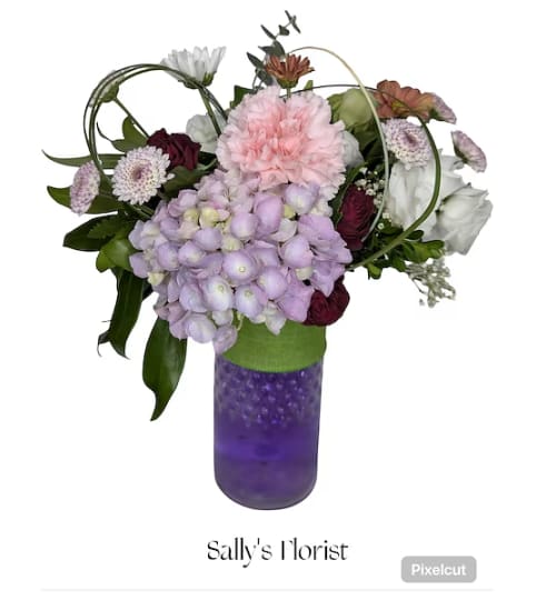 Sally's Designer Choice with Water Pearl. An arrangement by Triple A Florist.