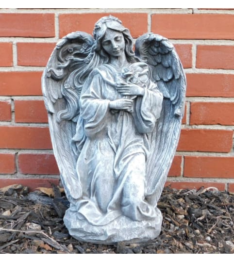 Statue - Large Rose Angel. An arrangement by Tom Rodgers Flowers.