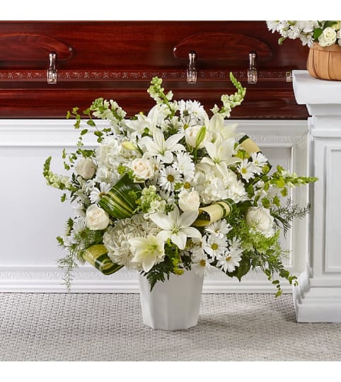 Thoughts of Tranquility Floor Basket. An arrangement by North Liberty Flower Shop.