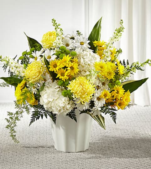 Unity and Grace Floor Basket. An arrangement by North Liberty Flower Shop.