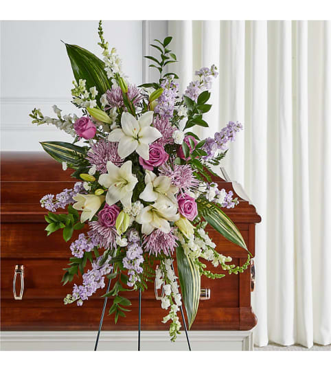 Grateful Hearts Easel Spray. An arrangement by North Liberty Flower Shop.