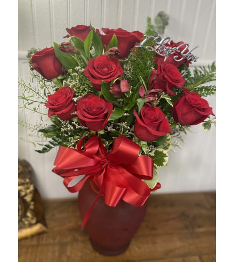 Romantic Rose Special (12 Red Roses). An arrangement by The Flower Box Florist.