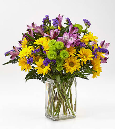 Dreaming of Daisies Bouquet. An arrangement by North Liberty Flower Shop.