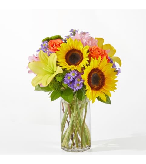 Basking in the Glow Bouquet. An arrangement by Sueppel's Flowers.