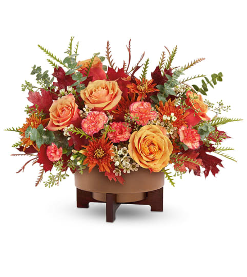 Modern Copper Centerpiece. An arrangement by Sueppel's Flowers.