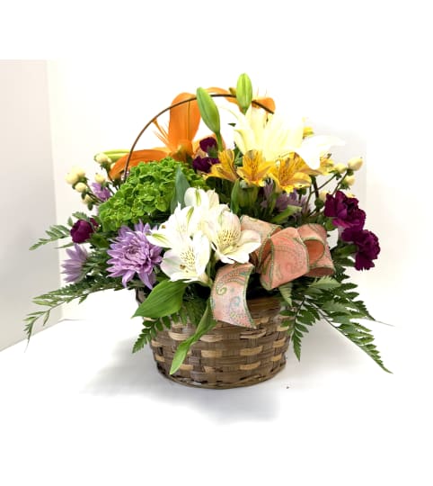 Nature's Bloom. An arrangement by Brown Floral and Fudge.