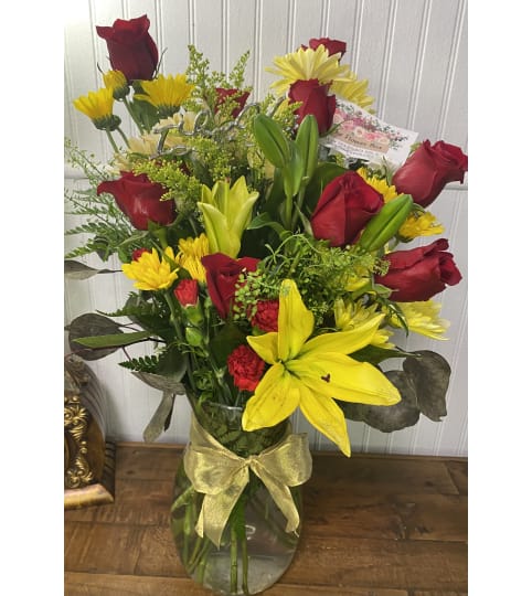 Scarlet and Gold Harmony. An arrangement by The Flower Box Florist.