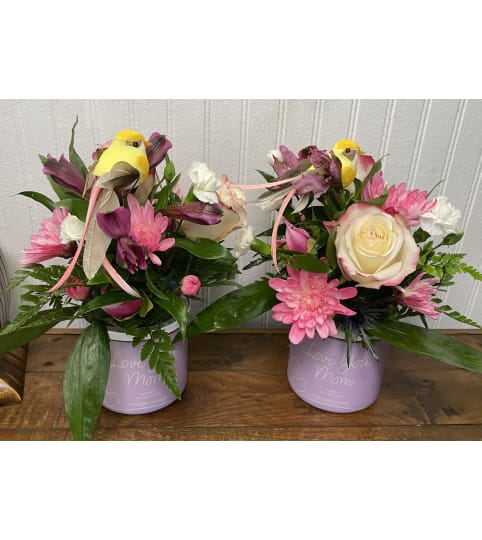 Love You Mom (Yankee Candle). An arrangement by The Flower Box Florist.