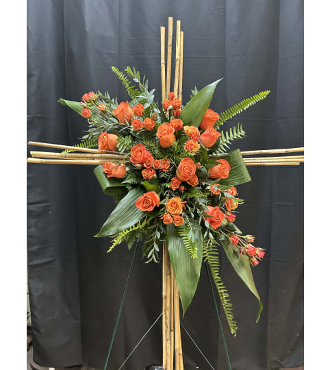 Sunset Grace Cross. An arrangement by Flowers by Neil.