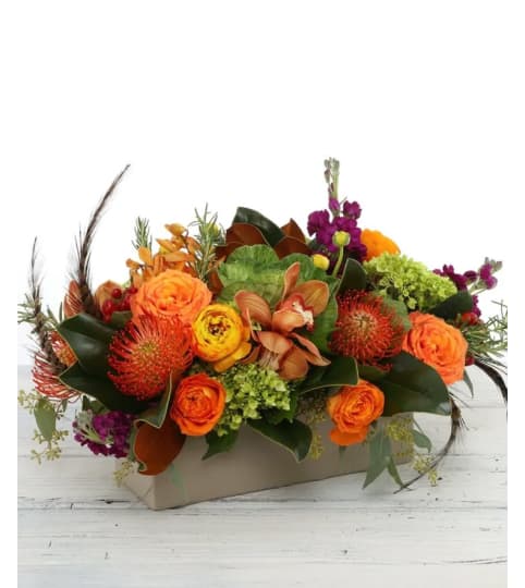 MAJESTIC GRACE TABLECENTER. An arrangement by A Loving Touch Florist.