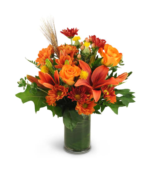 Autumn Awakening. An arrangement by Julie's Artistic Rose.