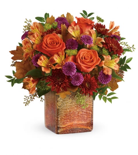 Teleflora's Golden Amber Bouquet T17T300A. An arrangement by Jennifer's Flowers and Gifts.