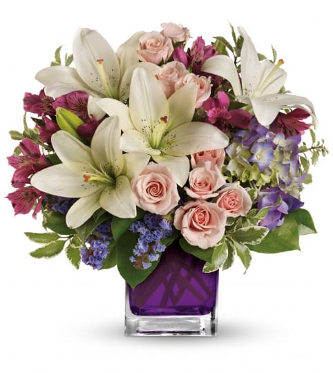Garden Romance TEV20-1. An arrangement by Jennifer's Flowers and Gifts.