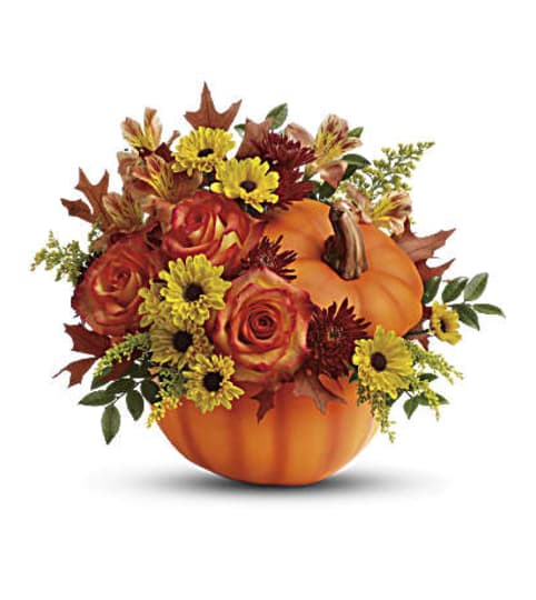 Teleflora's Warm Fall Wishes Bouquet. An arrangement by Love Floral.