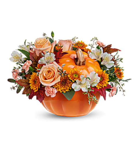 Teleflora's Hello Pumpkin Bouquet. An arrangement by Love Floral.