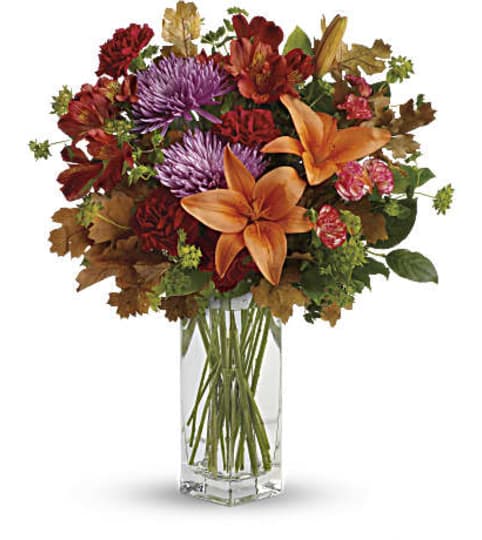 Teleflora's Fall Brights Bouquet. An arrangement by Love Floral.