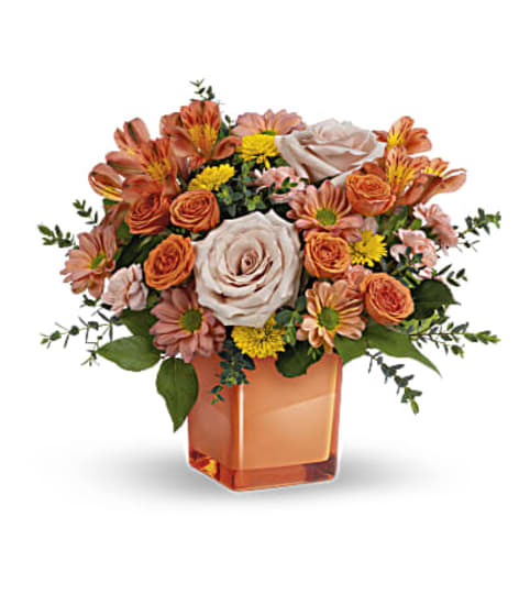 Teleflora's Orange Splendor Bouquet. An arrangement by Love Floral.