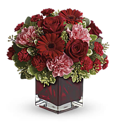 Together Forever. An arrangement by Jennifer's Flowers and Gifts.