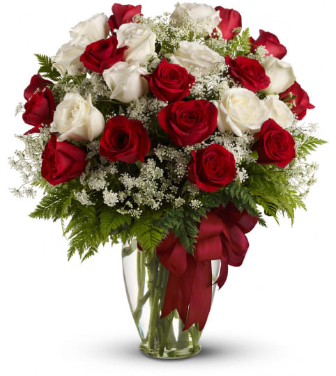 Love's Divine Roses T11Z101A. An arrangement by Jennifer's Flowers and Gifts.
