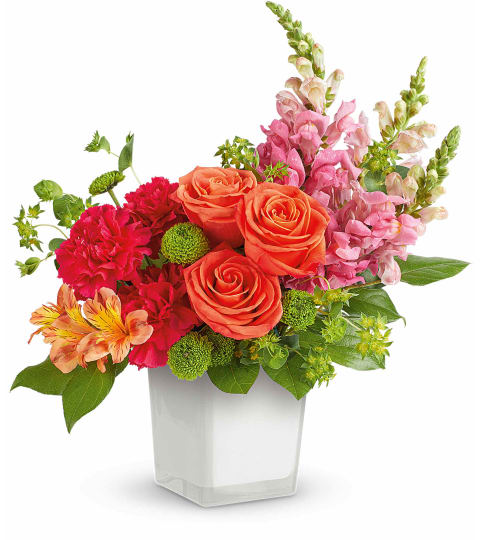 Citrus Sunset Bouquet TEV75-5A. An arrangement by Jennifer's Flowers and Gifts.
