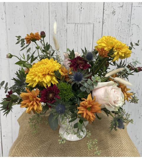 Fall Harvest. An arrangement by Red Rose Incredible Florist.