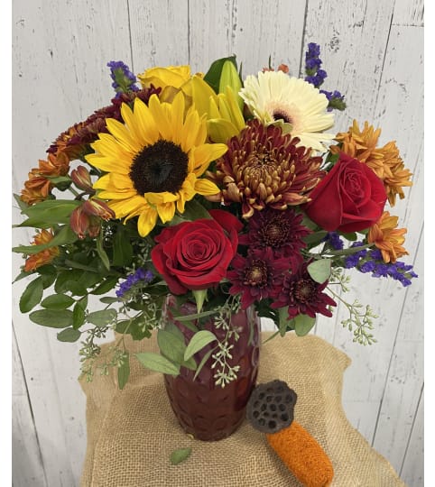 Autumn Sunshine. An arrangement by Red Rose Incredible Florist.