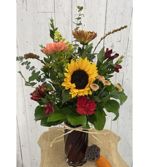 Sunset Dream. An arrangement by Red Rose Incredible Florist.