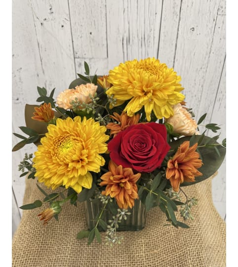 Fall Bright. An arrangement by Red Rose Incredible Florist.