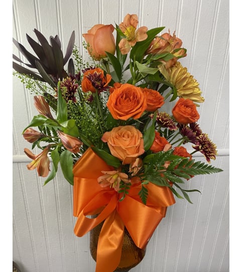 Warm Wishes Arrangement. An arrangement by The Flower Box Florist.