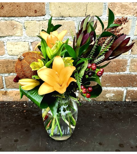 'By Design' Autumn Bounty. An arrangement by Flowers By Design.