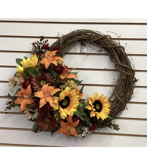 Grapevine Fall Wreath. An arrangement by Roma Flowers and Gifts.