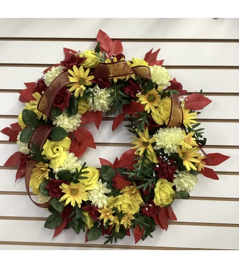 Falling for You Wreath. An arrangement by Roma Flowers and Gifts.