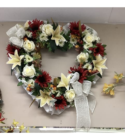 Fall Wreath with boarder. An arrangement by Roma Flowers and Gifts.