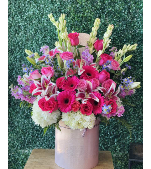 Beauty and Bliss. An arrangement by Flower World and Gifts.
