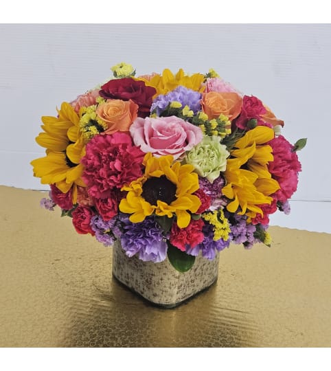 Rainbow Cube. An arrangement by Brickell Exclusive Blooms.