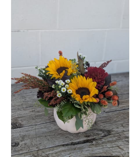 Harvest Glow. An arrangement by The Garden Gate Gifts and Florals.