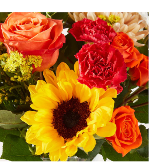 FTD Sweater Season-Florist Original. An arrangement by Fellows Fernlea Flowers.