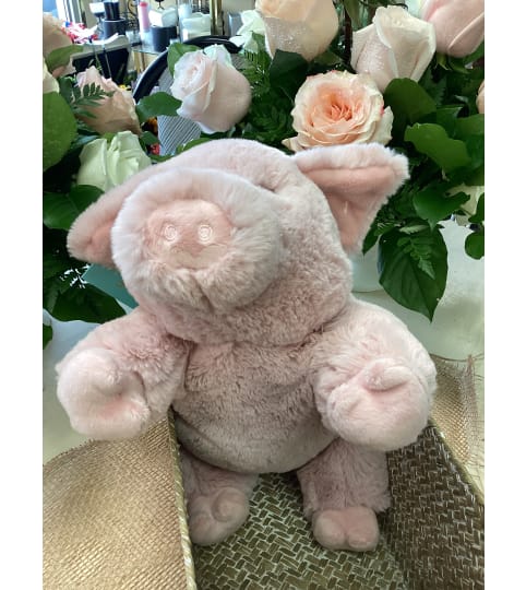 Pink Piggy Warm Buddy. An arrangement by Roma Flowers and Gifts.