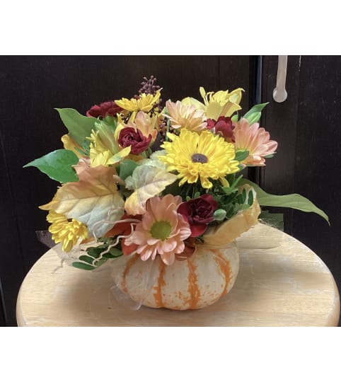 Mini Pumpkin Cuteness. An arrangement by Roma Flowers and Gifts.