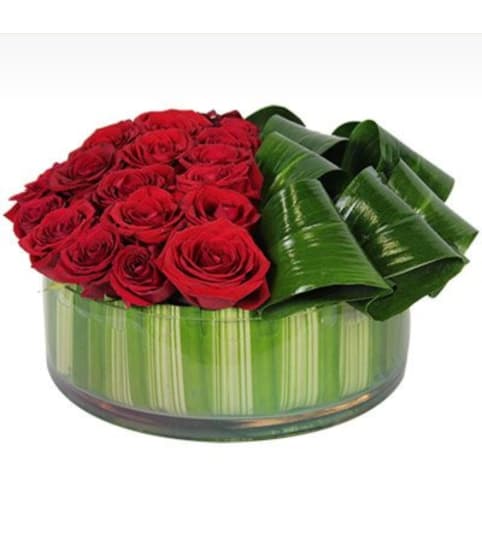 Red Roses with Green. An arrangement by Brickell Ave Florist.