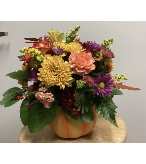 Orange You Glad Pumpkin. An arrangement by Roma Flowers and Gifts.