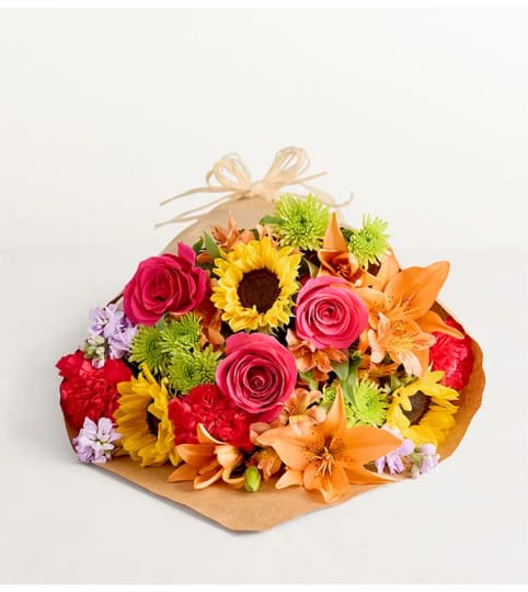 Sunshine Bloom Bouquet. An arrangement by Elegant Florist.