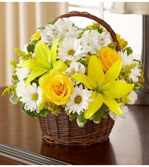 Peace, Prayers and Blessings - Yellow and White. An arrangement by Graceland Florist.