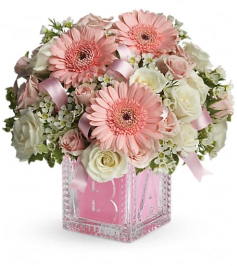 Baby's First Block by Teleflora - Pink. An arrangement by Pompano Beach Floral.