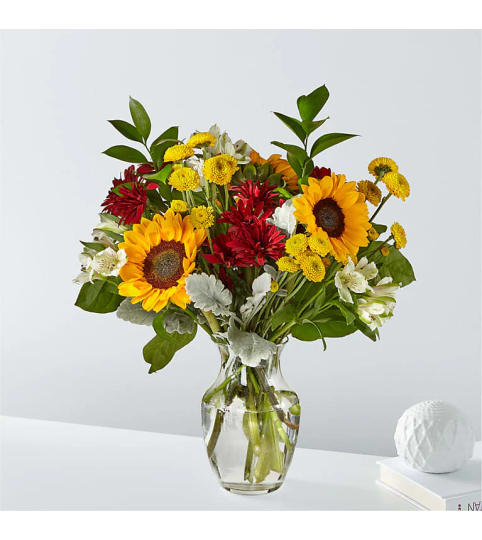 The Prairie Sunrise Bouquet. An arrangement by Country Cousins Flower Shop.