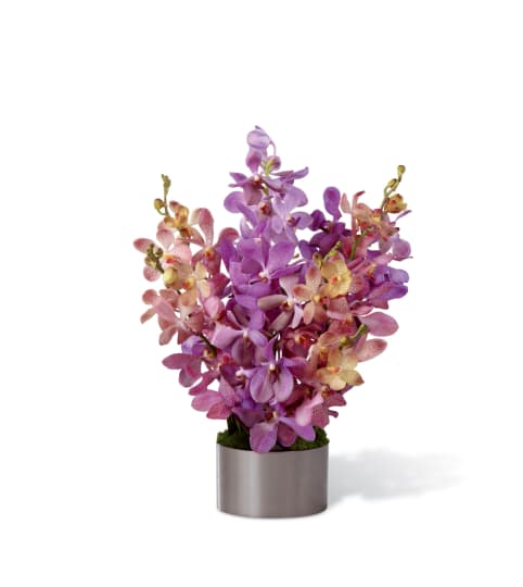 The FTD® Irresistible Orchid™ Bouquet. An arrangement by Country Cousins Flower Shop.