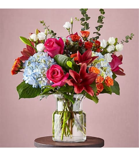 FTD Casablanca Bouquet. An arrangement by Country Cousins Flower Shop.