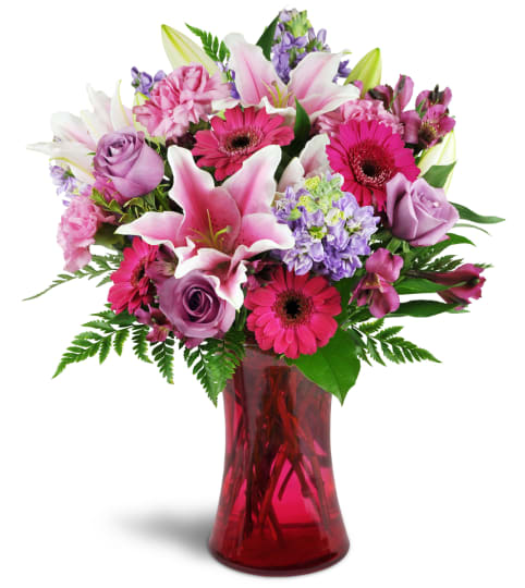 Bright Medley™. An arrangement by Strawberry Fields Flowers and Gifts.